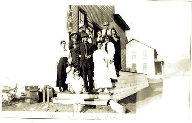Some of the family poses on the steps of Sebastian's General Store around 1921 with Sebastian's Bay View Hotel in the background.